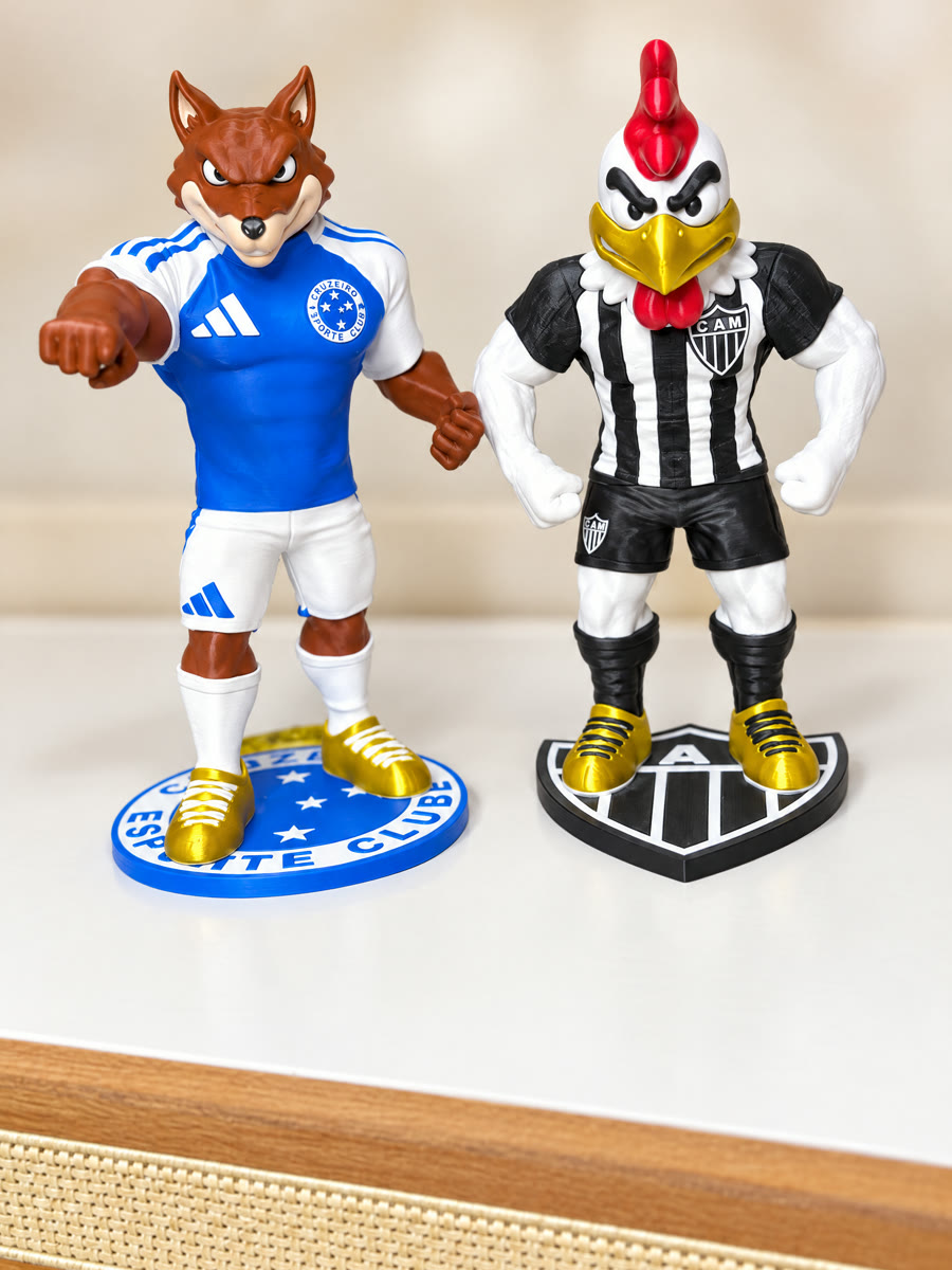 Dois mascotes de times de futebol em base